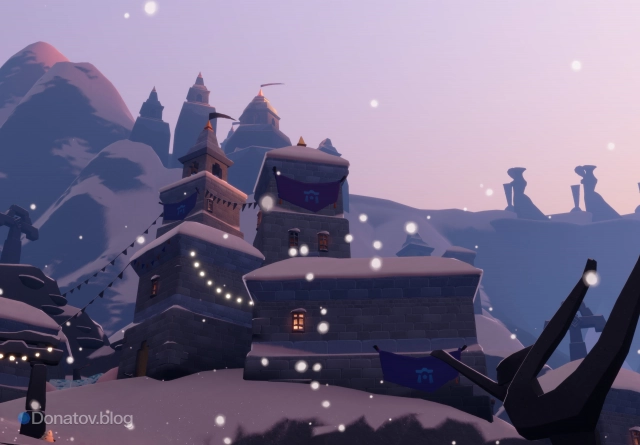 Высокая каменная башня перед скоплением красных свечей