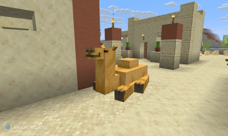 Верблюд сидит в Пустынной деревне