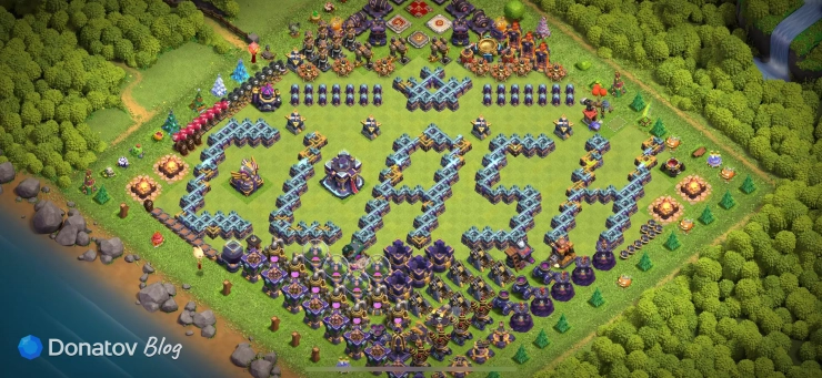 Деревня в Clash of Clans с надписью Clash