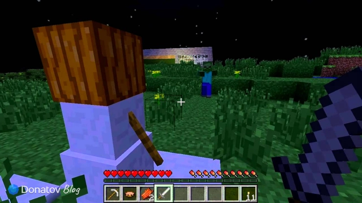Снежный голем сражается с зомби в Minecraft